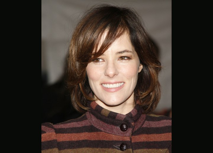 Parker Posey with an easy to do medium length hairstyle.