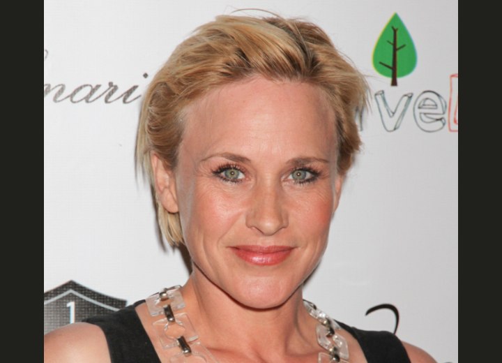 Patricia Arquette wearing her short hair swept back