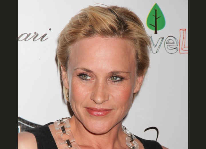 Patricia Arquette's shorter hairstyles | Short bob that is swept back from  the face