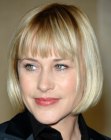 Patricia Arquette's short bob with bangs that frame the face