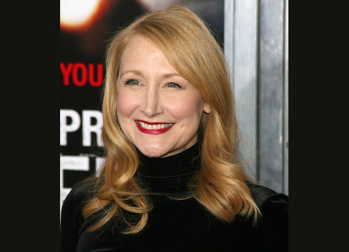 Patricia Clarkson with long reddish blonde hair