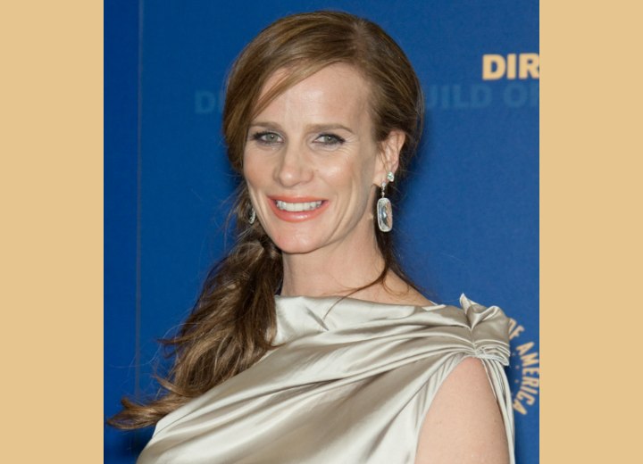 Rachel Griffiths with her hair styled to one side