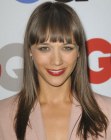 Rashida Jones sporting smooth long hair with blunt bangs