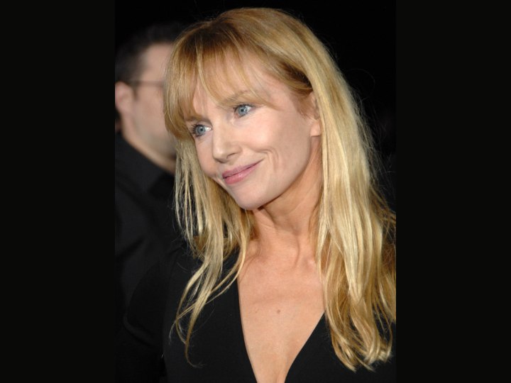 Rebecca de Mornay wearing long hair as an older woman