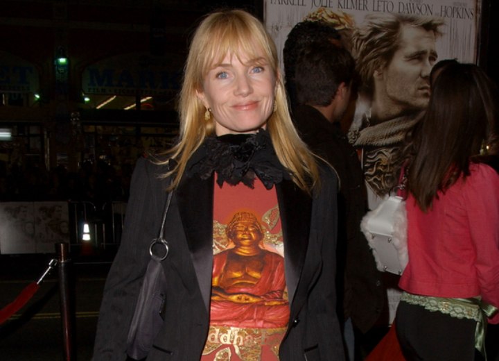 Rebecca de Mornay wearing a T-shirt and suit jacket