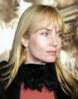 Rebecca de Mornay sporting a simple long hairstyle with wispy bangs