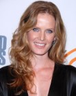 Rebecca Mader wearing her hair long with bouncy curls