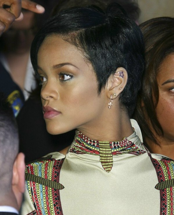 Rihanna's hair in a short cropped style and contoured 