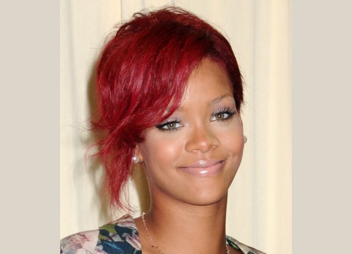 Rihanna with short cherry color or red hair