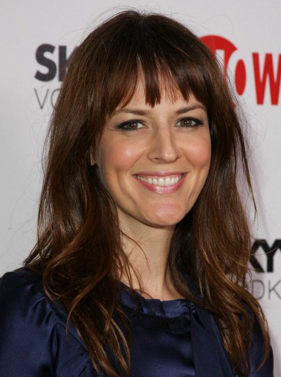Rosemarie DeWitt wearing a natural long hairstyle that 