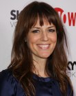 Rosemarie DeWitt's long hair with layers and above the eyebrows bangs