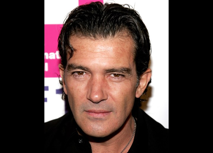 Antonio Banderas with slicked-back hair