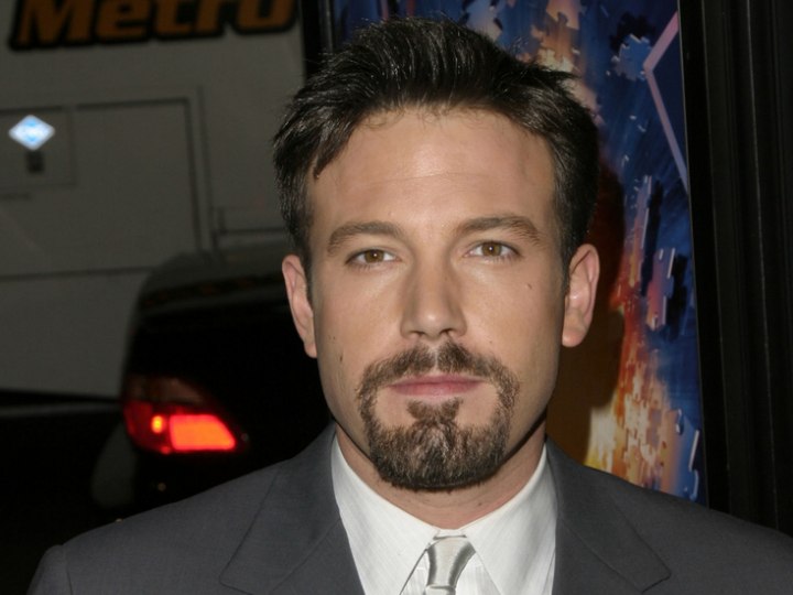 Ben Affleck with a short debonair hairstyle and sideburns Ben Affleck with a short debonair hairstyle and sideburns