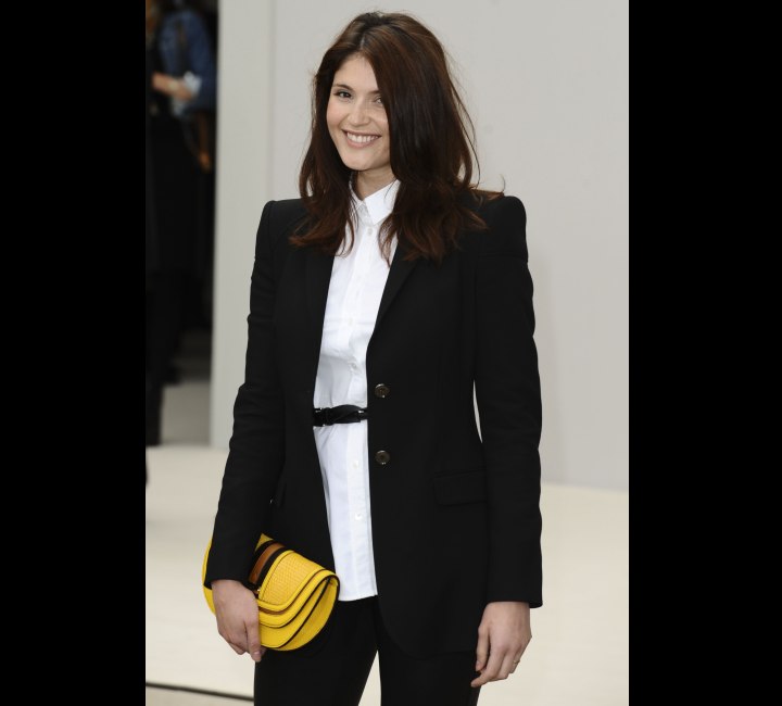 Gemma Arterton wearing a blouse with buttoned-up collar