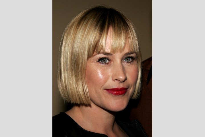 Patricia Arquette with short hair and bangs