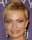 Jaime Pressly wearing a stunning pixie cut with short wispy bangs