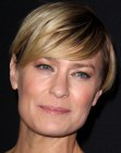 Robin Wright with her hair cut into a pixie with long side bangs