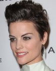Jaimie Alexander's pixie cut with the hair tapered around the ears