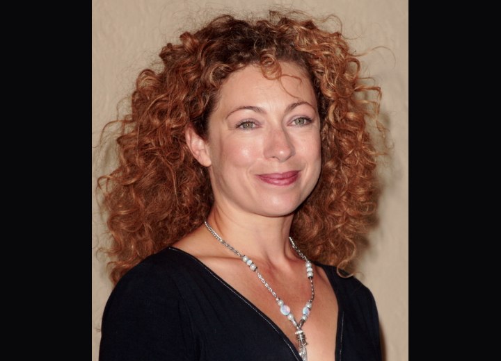 Alex Kingston with a head full of natural curls