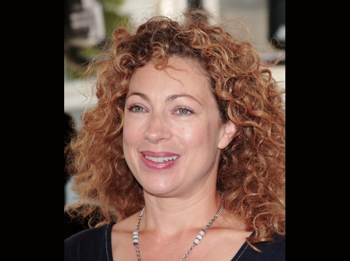 Alex Kingston with ginger hair