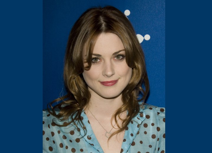 Alexandra Breckenridge wearing her hair with a middle part