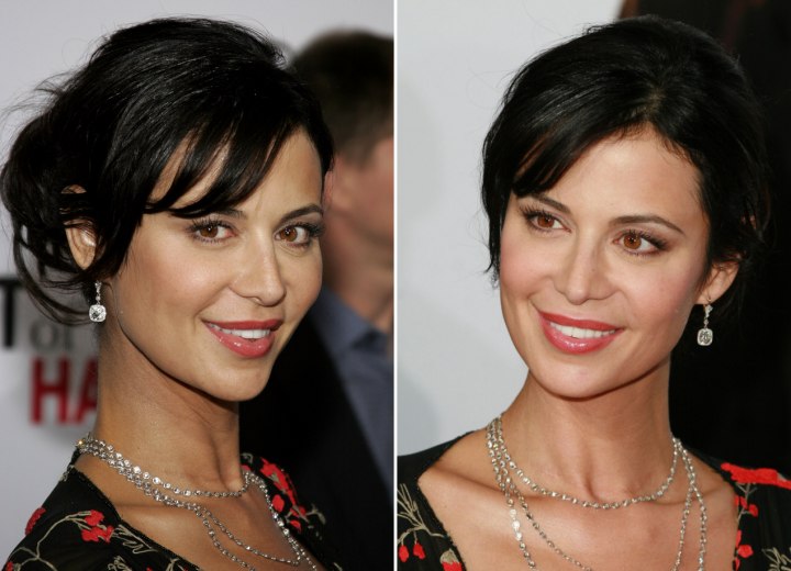 Catherine Bell with her hair pulled back and styled up 