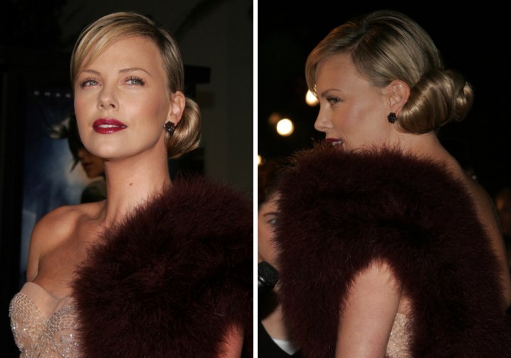 Charlize Theron wearing her hair up for a Greta Garbo look