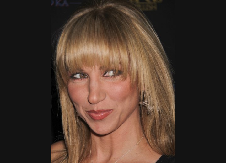 Deborah Gibson's hair with irregular bangs