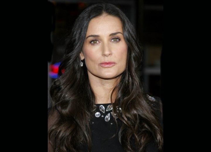 Demi Moore with long curled hair