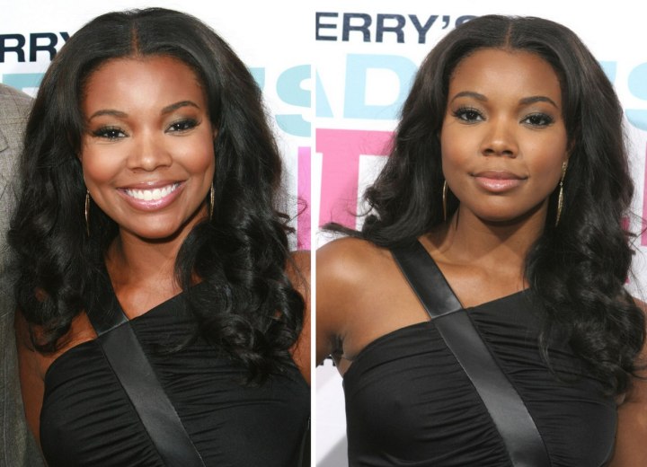 Gabrielle Union wearing her hair long with curls