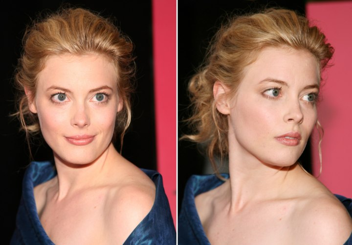Gillian Jacobs with her hair brushed back and styled up
