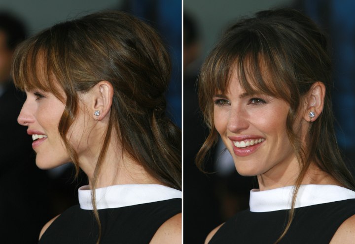 Jennifer Garner with her long hair gathered back