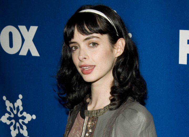 Krysten Ritter wearing a hair band in her long hair