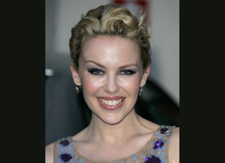 Kylie Minogue with short curly hair