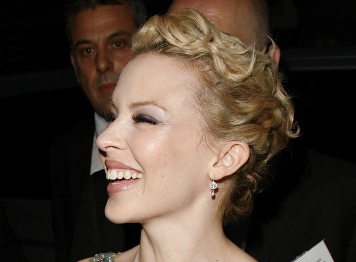 Kylie Minogue wearing a short retro hairstyle