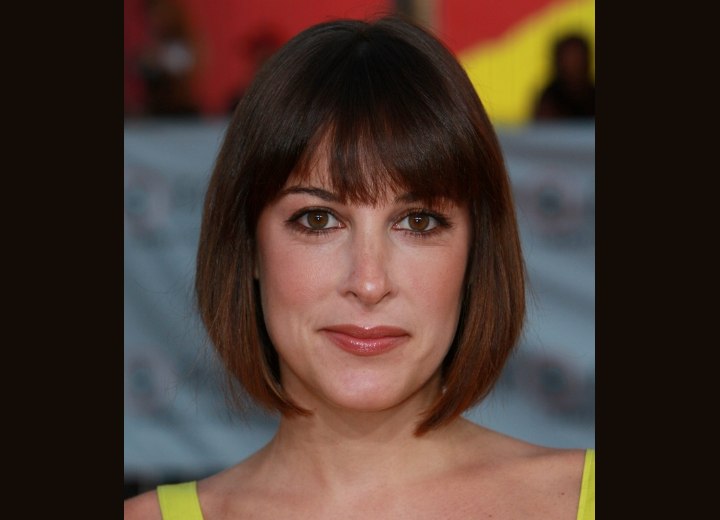 Lindsay Sloane with her hair in a bob with a shorter nape