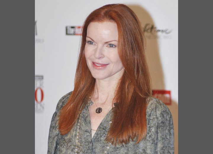 Redheaded Marcia Cross with long hair