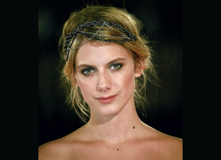 Melanie Laurent wearing her hair up