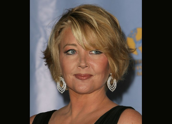 Melody Thomas Scott wearing her hair short with layers