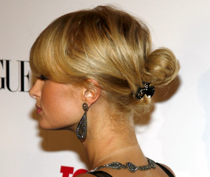 Side and back view of Paris Hilton's hair in an up style