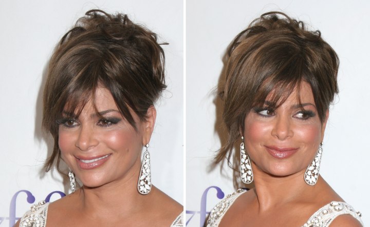 Paula Abdul wearing her brunette hair up