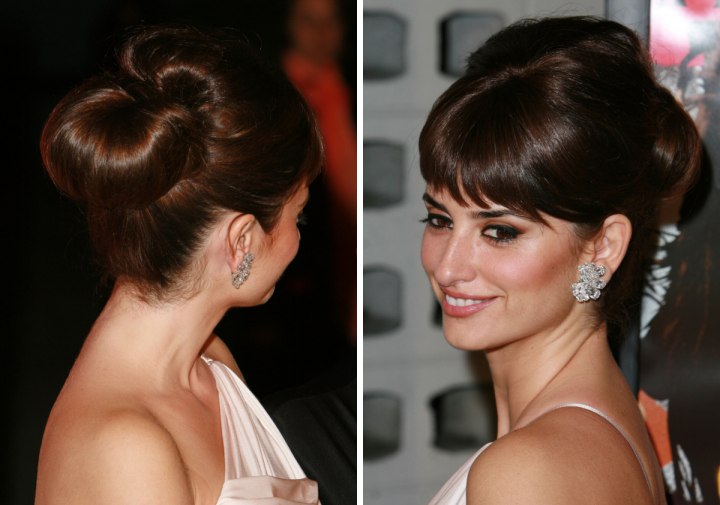 Penelope Cruz with her hair styled into a bun