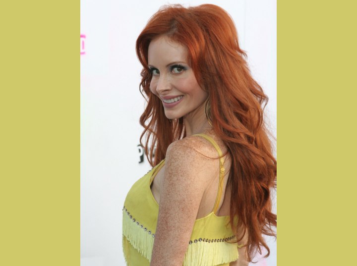 Phoebe Price with long red hair