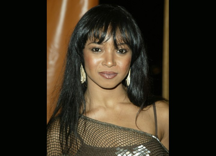 Tamala Jones with long straight hair