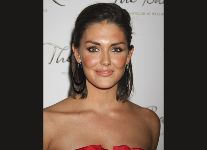 Taylor Cole wearing her hair styled away from her face