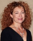 Alex Kingston's long hair with natural curls