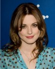 Alexandra Breckenridge's long hairstyle with a center part