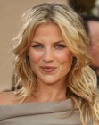 Ali Larter's long blonde hair with visible new growth