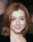 Alyson Hannigan with a medium hairstyle that covers her neck