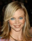 Amy Smart's shoulder length jagged and layered haircut with side bangs